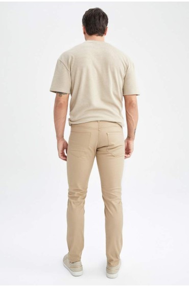شلوار پارچه ای کتان سوپر اسلیم فیت مردانه رنگ بژ  دیفکتو