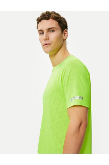 تیشرت اسپرت با شعار چاپ شده در پشت، یقه خدمه، آستین راگلان مردانه سبز نئون  کوتون