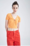 تیشرت آستین کوتاه یقه هفت فیت زنانه نارنجی روشن دیفکتو