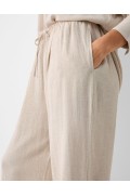 شلوار پارچه ای کالوت کتان با کمر کشی زنانه کرم رنگ برشکا