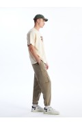 شلوار پارچه ای جیبدار فیت مردانه راحت مردانه خاکی روشن  ال سی وایکیکی