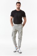 شلوار پارچه ای جیبی جیبدار با پاهای کشی مردانه استخوانی  ال سی وایکیکی