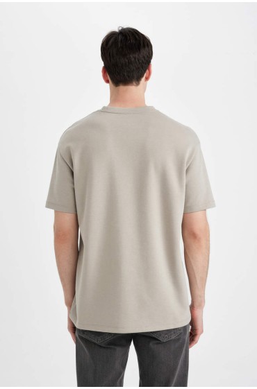 تیشرت آستین کوتاه پارچه سنگین طرح گرافیکی با یقه گرد با فیت معمولی مردانه استخوانی  دیفکتو