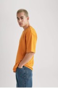 تیشرت پارچه ای سنگین با یقه آستین کوتاه با اورسایز مردانه نارنجی  دیفکتو