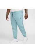 شلوار ورزشی مدل Nike Sportswear Tech Fleece رنگ شلوار جین فیروزه ای/مشکی مردانه نایک