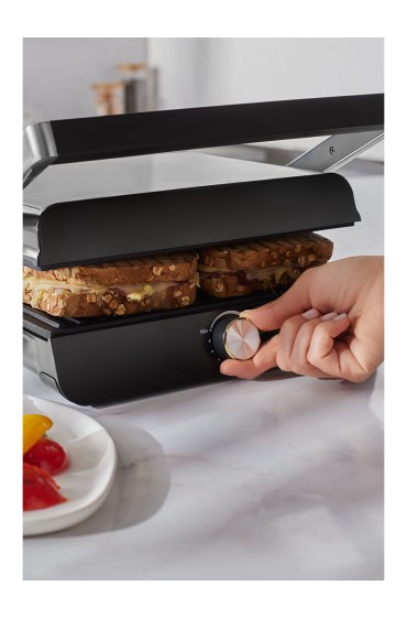 ساندویچ ساز دستگاه توستر و گریل چدنی گریلیانت ۱۳۴۶H با ظرفیت ۴ برش و قدرت ۲۰۰۰ وات هومند