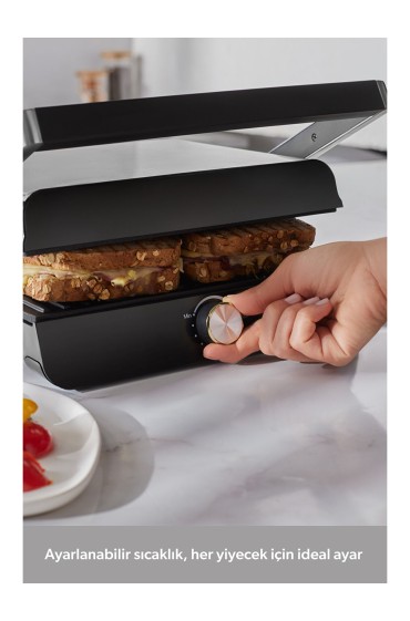 ساندویچ ساز دستگاه توستر و گریل چدنی گریلیانت ۱۳۴۶H با ظرفیت ۴ برش و قدرت ۲۰۰۰ وات هومند